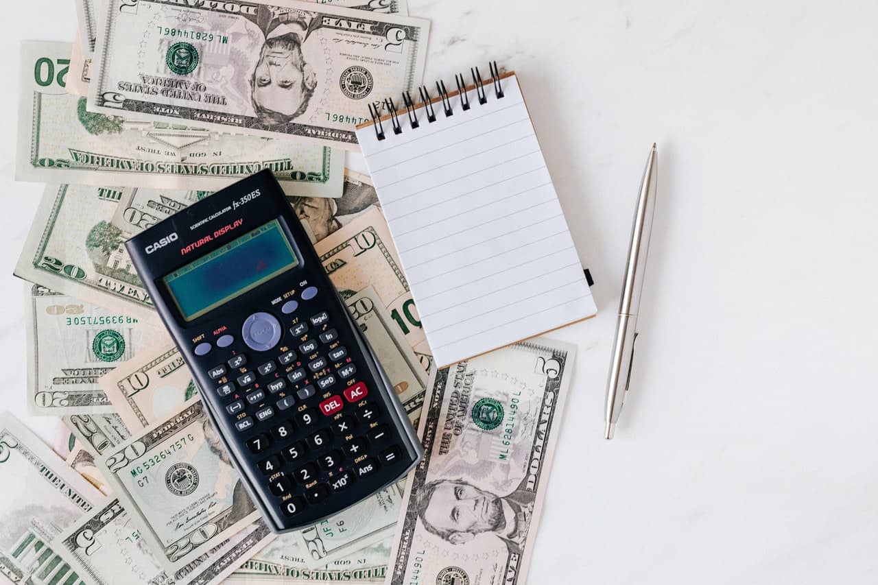Dollars a Calculator and Notepad