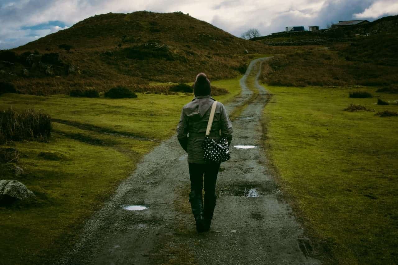 Person Walking down a Path Green Person Walking down a Path Green