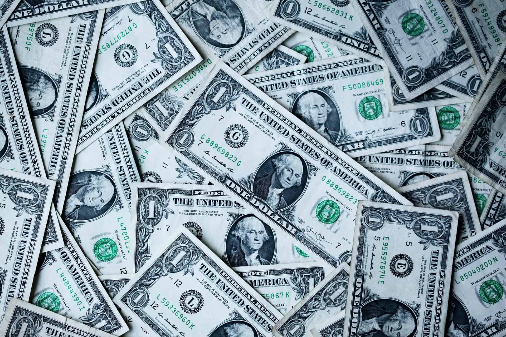 Table Filled With Dollar Bills Table Filled With Dollar Bills
