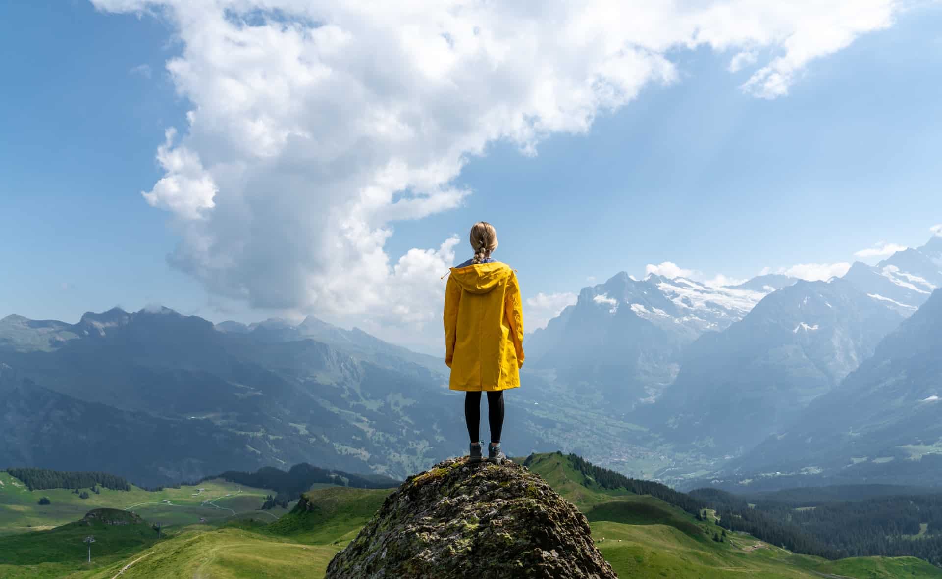 Woman Looking Out Over Valley