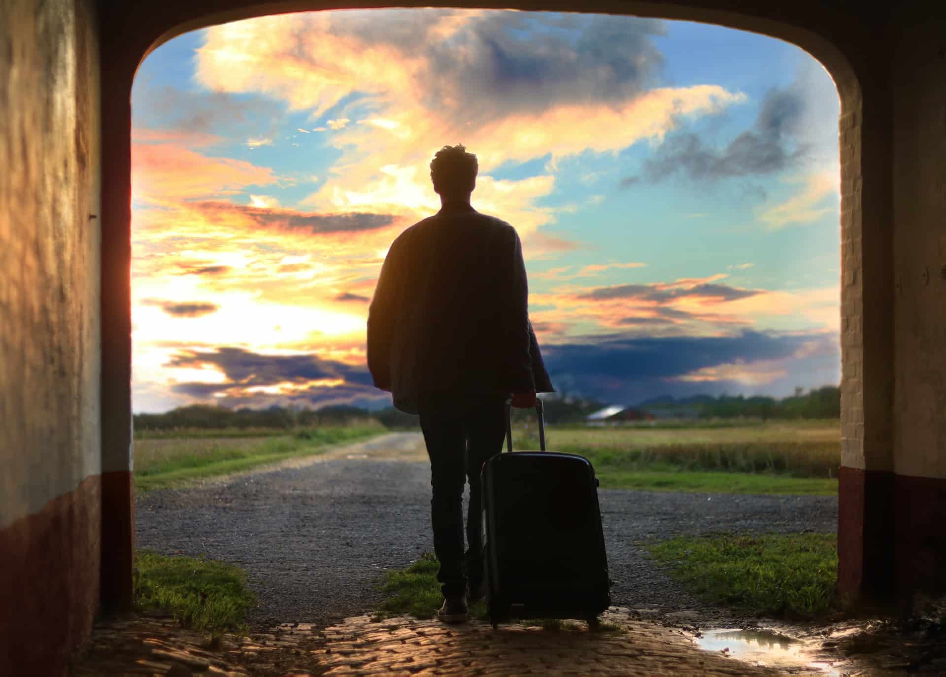 Person Leaving with Suitcase Person Leaving with Suitcase