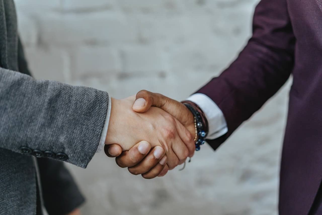 Two People Shaking Hands Two People Shaking Hands