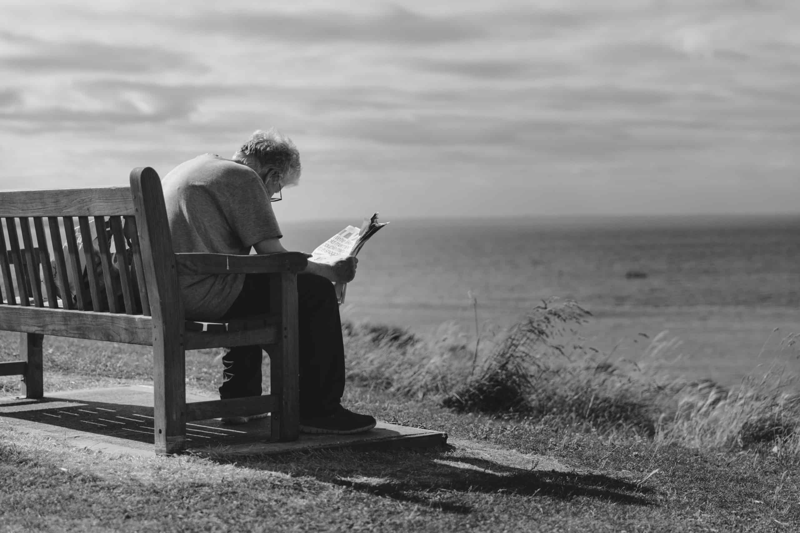 Old person reading bench old person reading bench