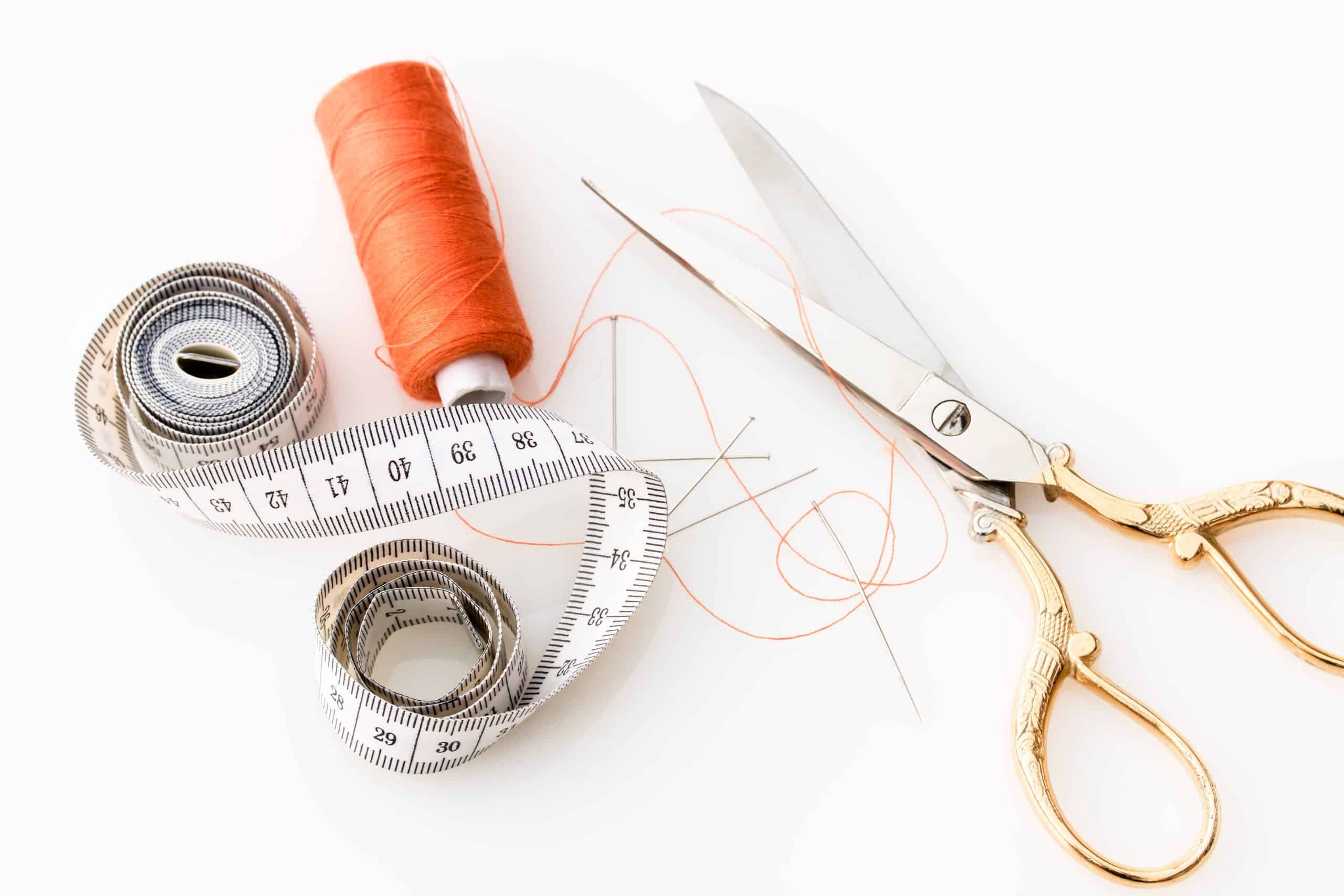 scissors cut measuring tape sewing