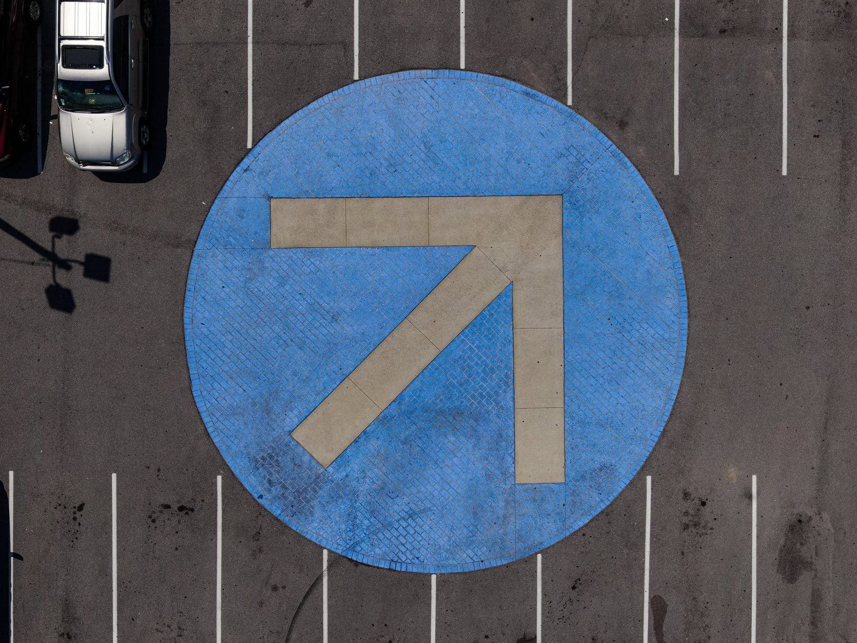 blue arrow parking lot