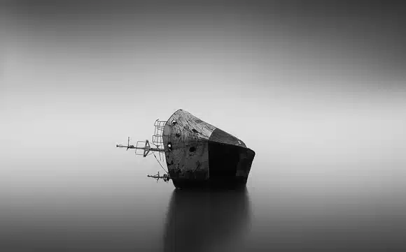sinking boat black and white