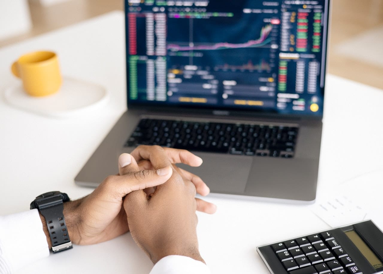 trading stocks at computer