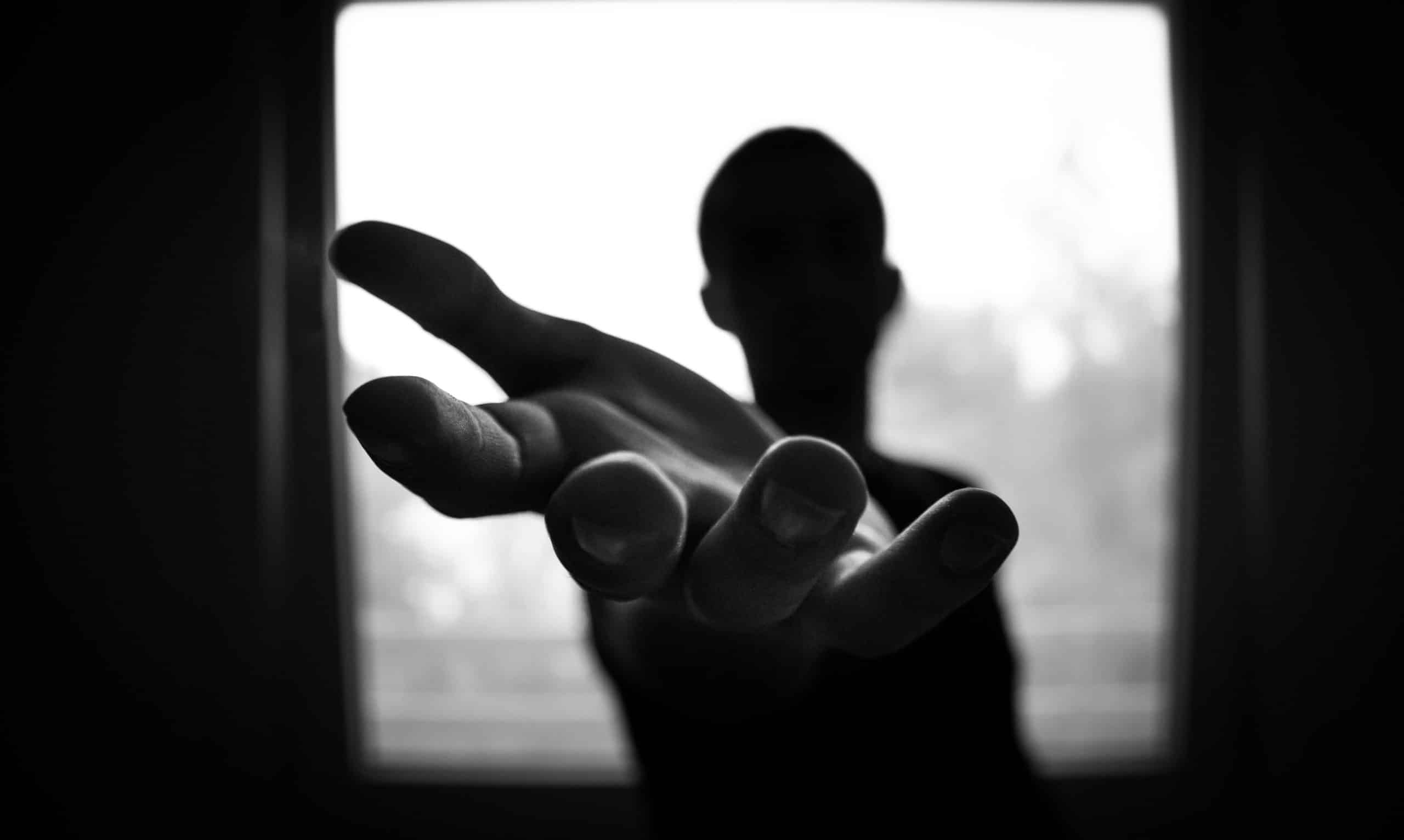 outstretched hand help silhouette