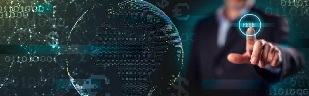 man pressing a screen button over modern background global reset tech person