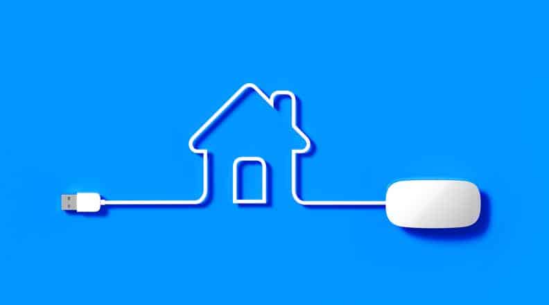 White Mouse Cable Forming A House Symbol on Blue Background White Mouse Cable Forming A House Symbol on Blue Background