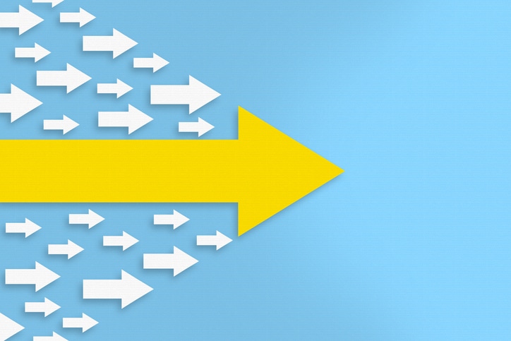 Leadership Concepts with Arrows on Blue Background Leadership Concepts with Arrows on Blue Background