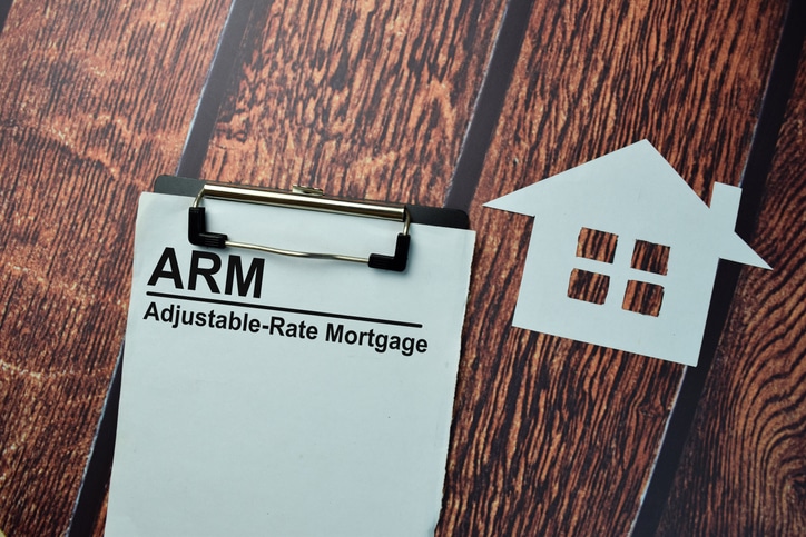 ARM – Adjustable-Rate Mortgage write on a paperwork isolated on office desk.