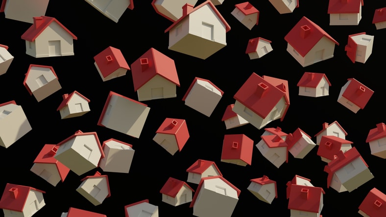 Cottage style houses hover in mid air in black background.