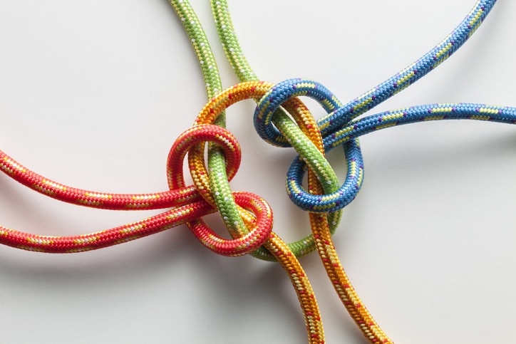 Colored ropes tied into a knot