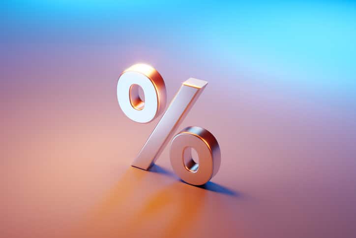 Percentage Sign Sitting Over Pink And Blue Background