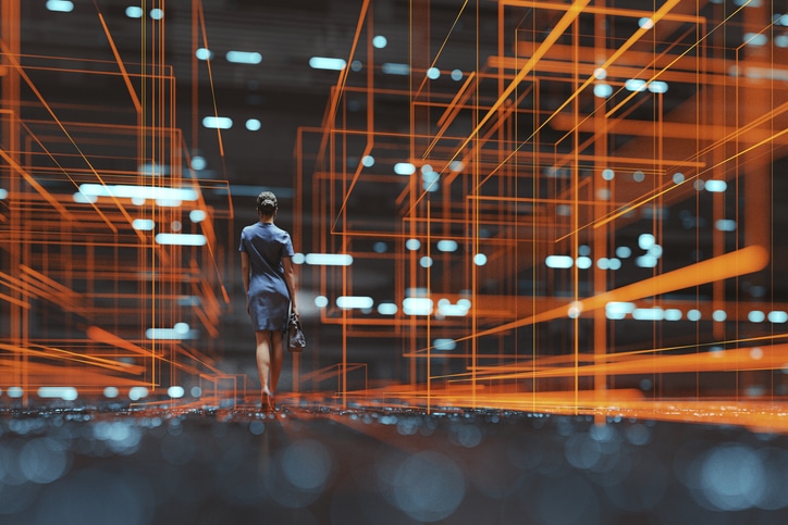 Futuristic city VR wire frame with businesswoman walking