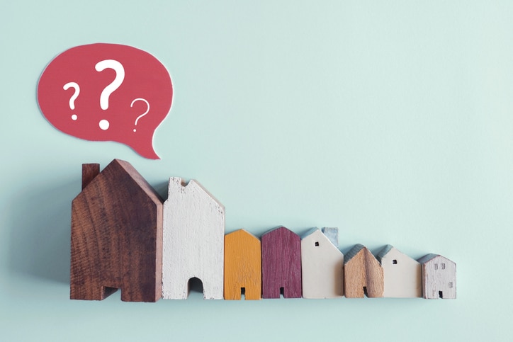Wooden houses with question marks, housing crisis, confused decision, insecure investment, choosing right property concept Rental Market Impacted Post Covid Pandemic