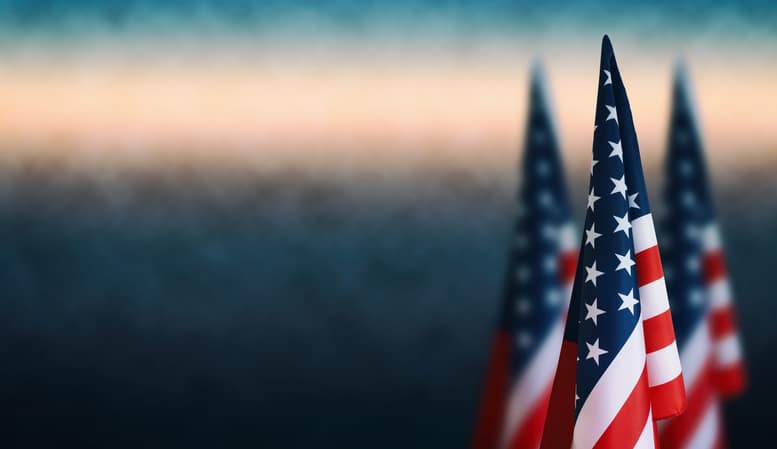 American flags Happy Veterans Day, Labour Day, Independence Day. Veteran Property Taxes help