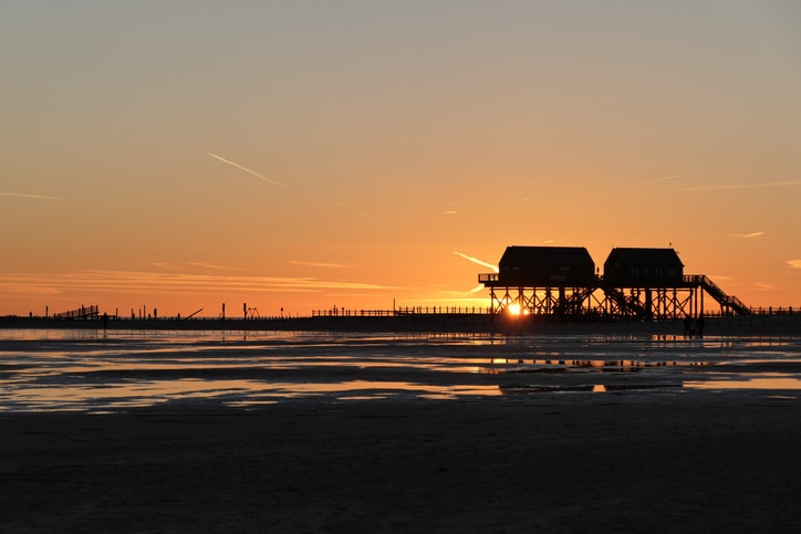 Sunset on the beach in December 2021 Stilt Home
