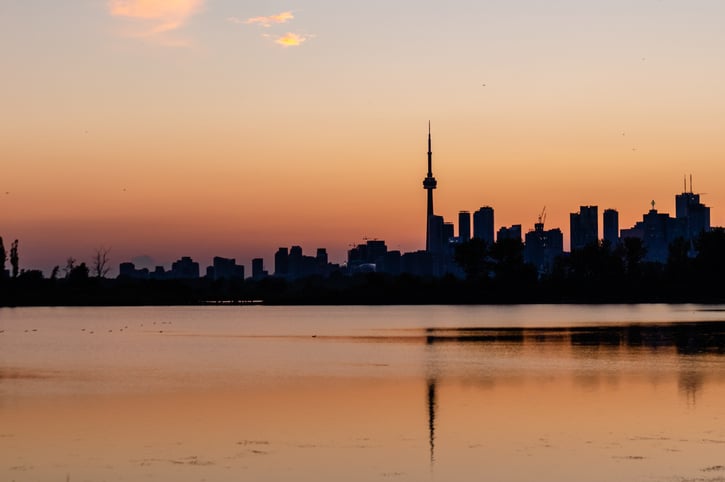 Toronto city skyline against a golden sunset