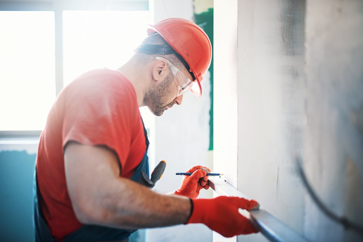 Construction worker during interior decoration.
