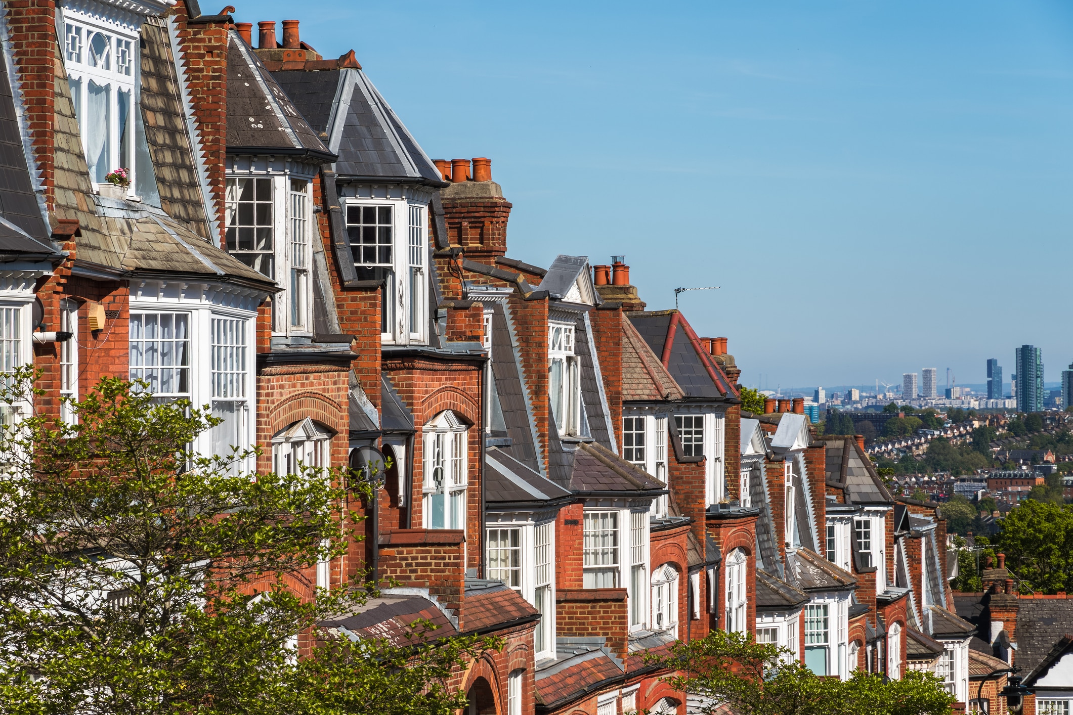 Terraced houses in Muswell Hill with London skyline in the background